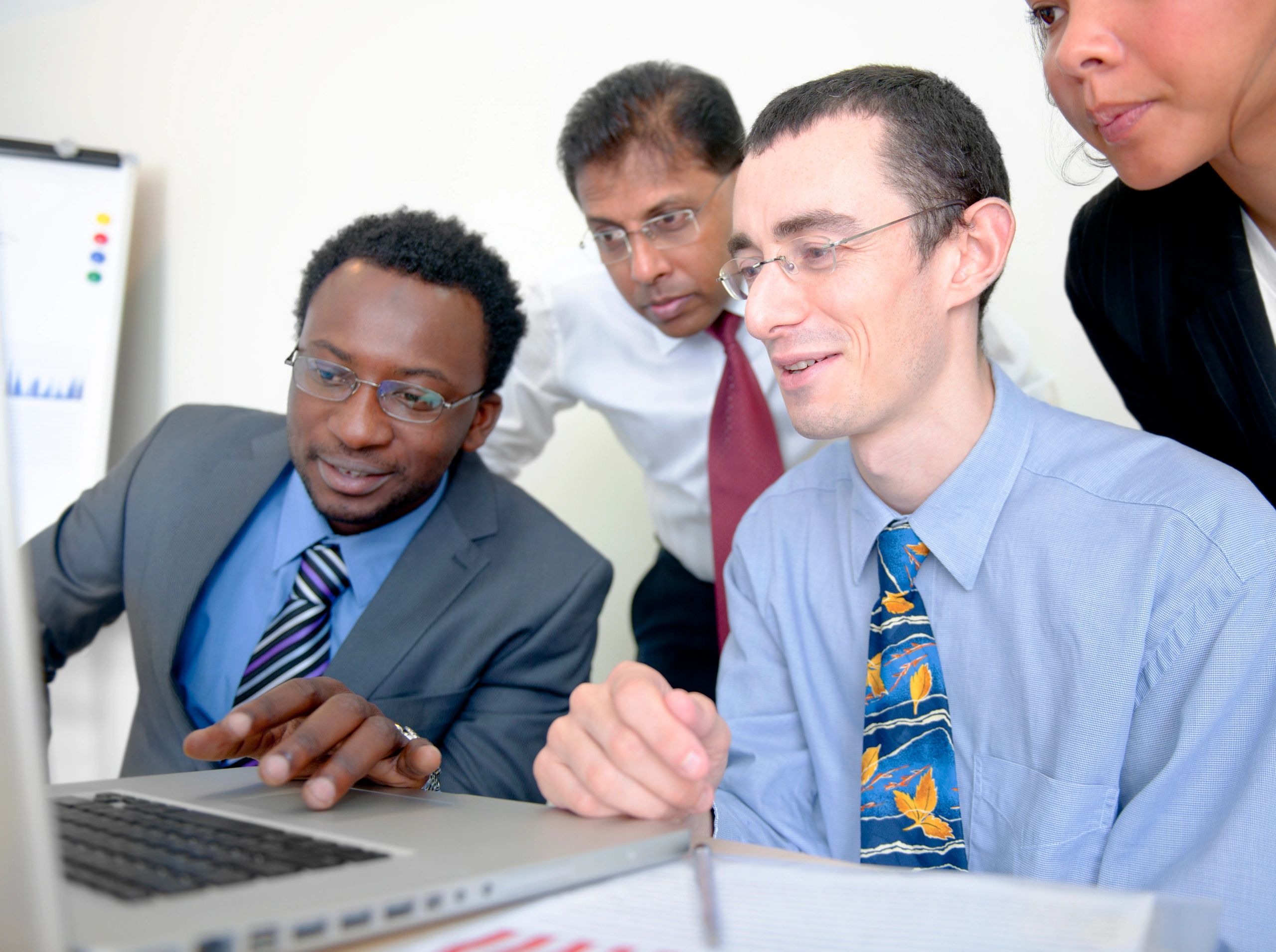 Editorial team collaborating in a digital newsroom